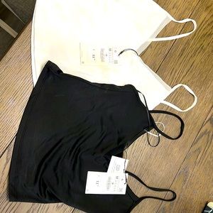 Two tank tops. Black and white. Medium. Selling together